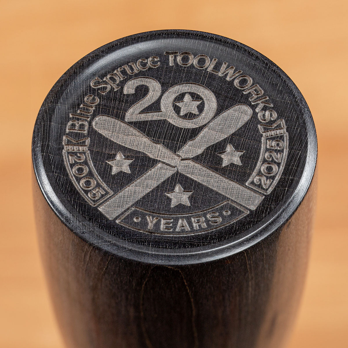 Closeup of the unique engraving on each Limited-Edition 20th Anniversary Round Mallet head.