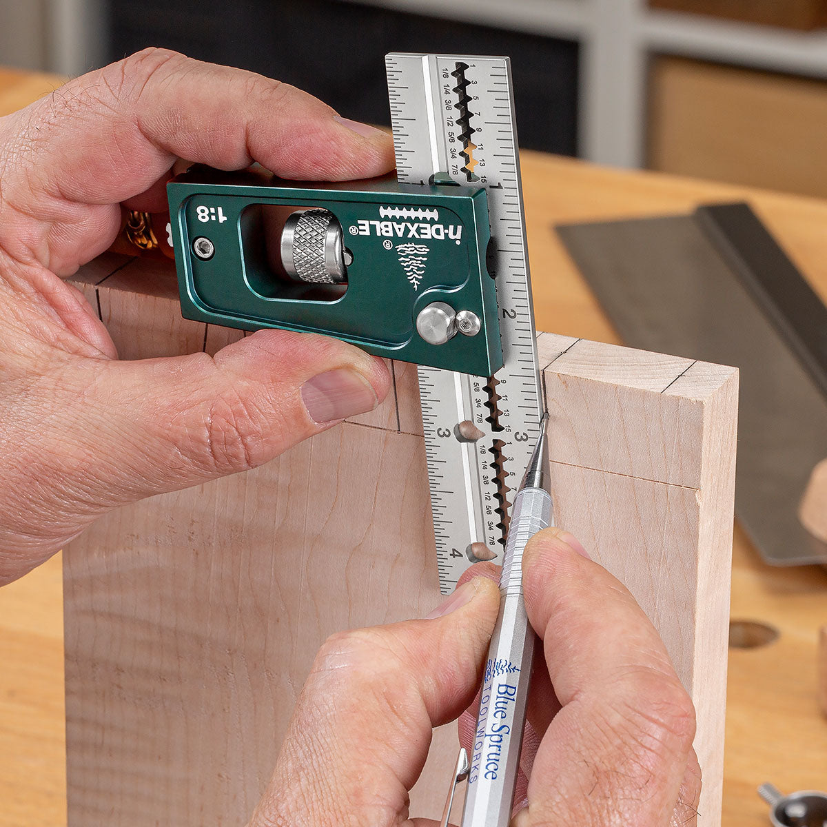 Using the 1 to 8 head, marking the tails on the face of a board for a dovetail joint.