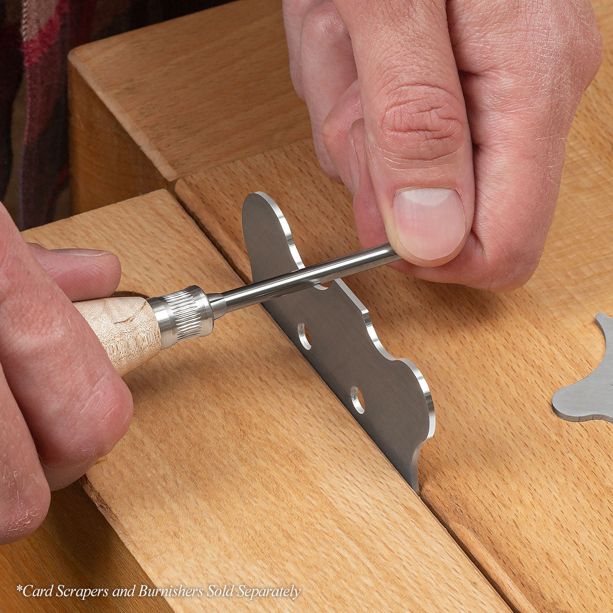 The Curly Maple .187 Solid Carbide Burnisher sharpening the Large Contoured Card Scraper.