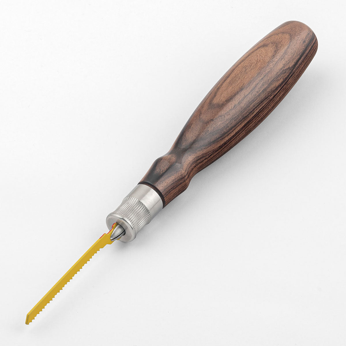 The Blue Spruce Jigsaw Blade handle in Bolivian Rosewood shown with a jigsaw blade installed.