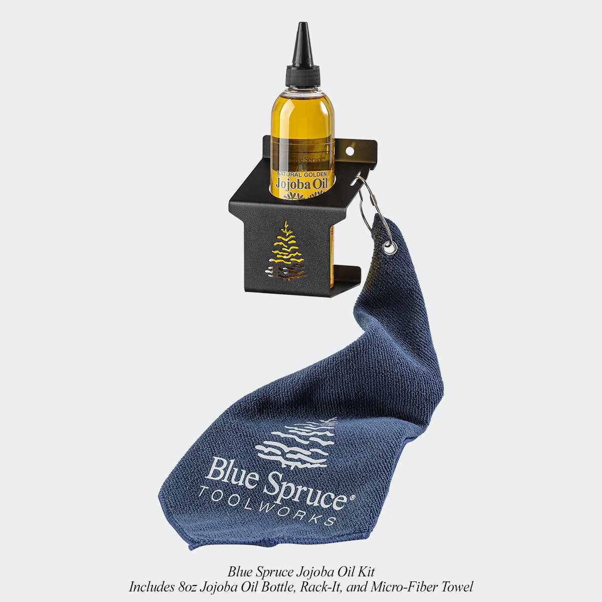 Jojoba Oil Kit includes the 8 oz. bottle, microfiber towel with the Blue Spruce logo, and a wall-mountable Rack-It