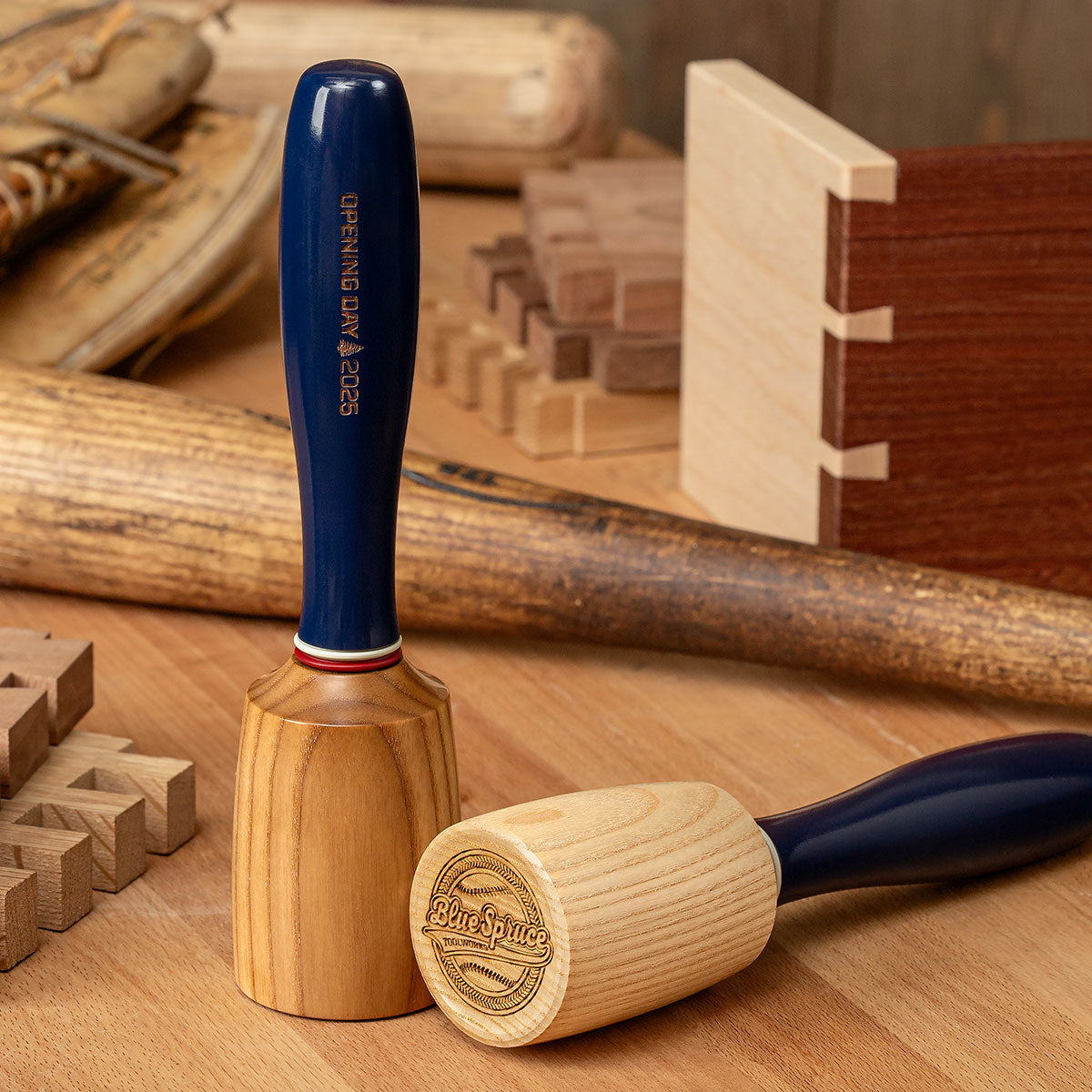 Two Limited-Edition Opening Day Mallets showing variation in the appearance of their respective mallet head.