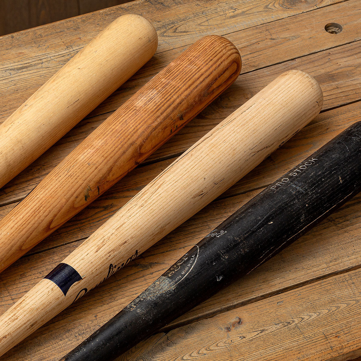 A closeup on a group of authentic, professionally used baseball bats that were used in the production of the Limited-Edition Opening Day Mallet.