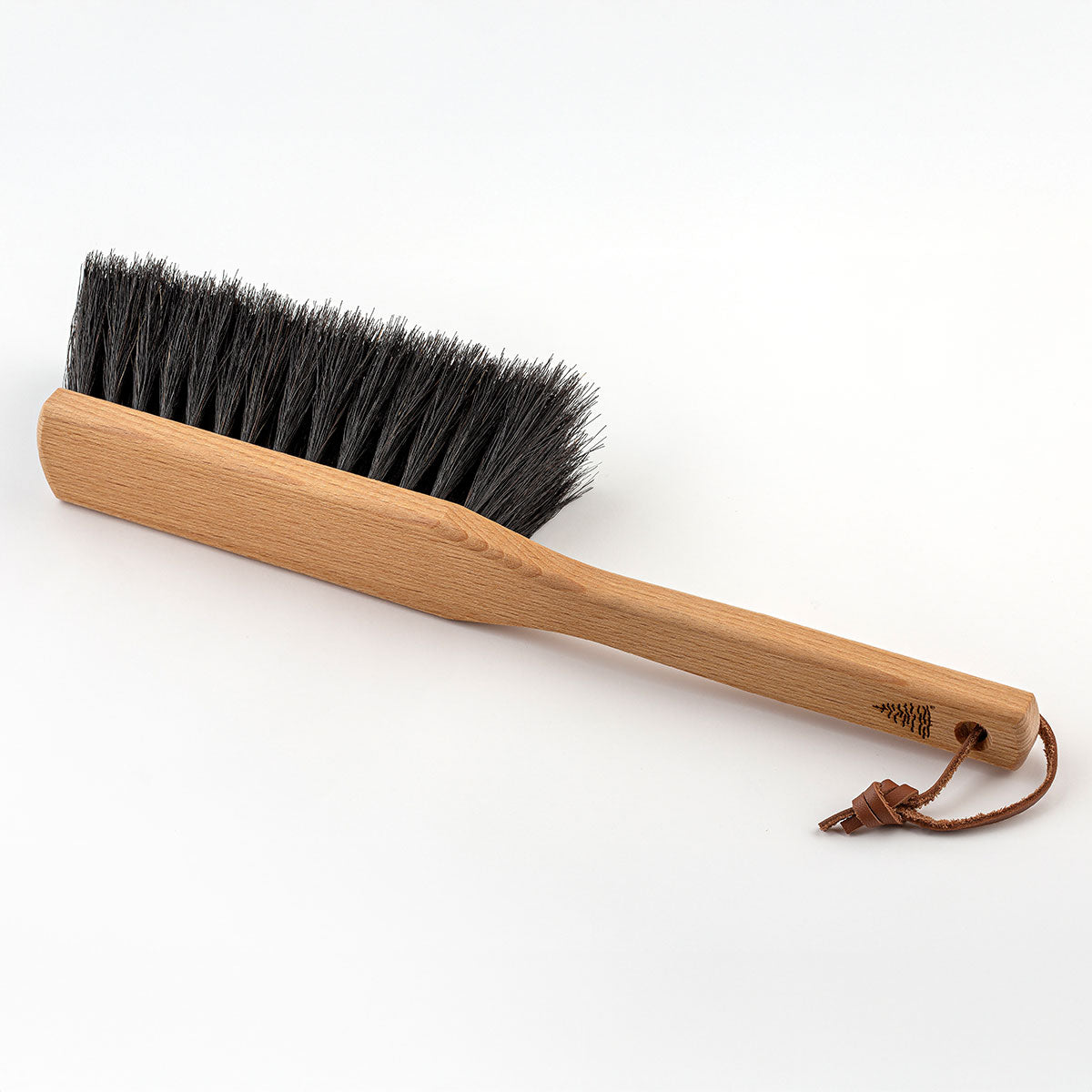 The Bench Brush’s 13-1/2” long handle is easy and comfortable to hold.