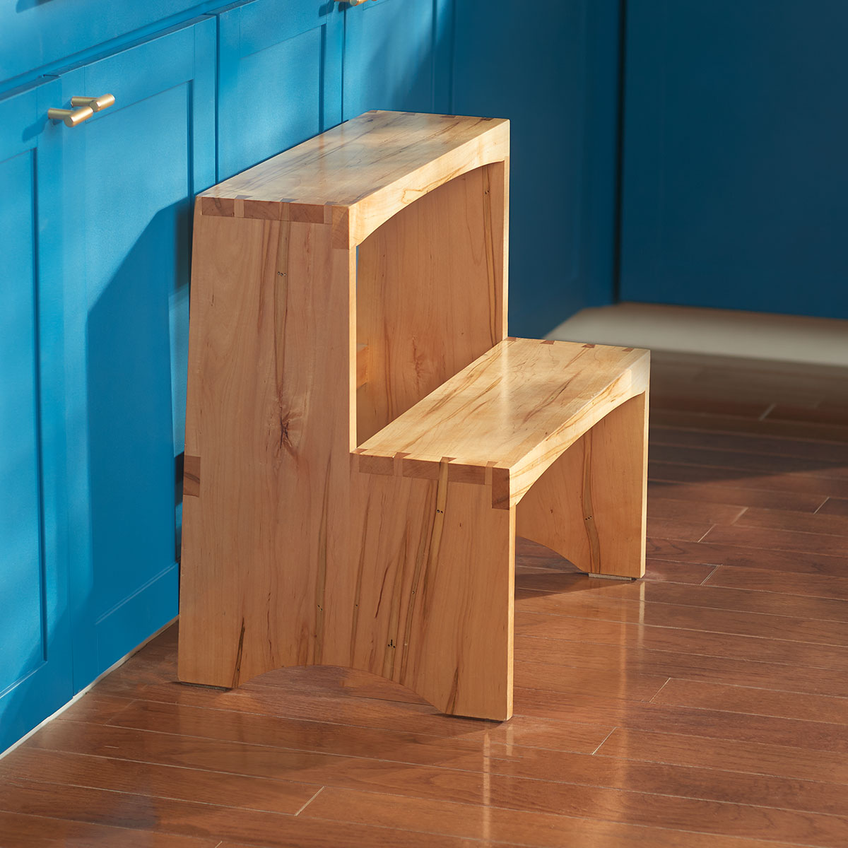 Close-up view of the joinery in the finished product of the Wicked Smaht Stepstool project plans.