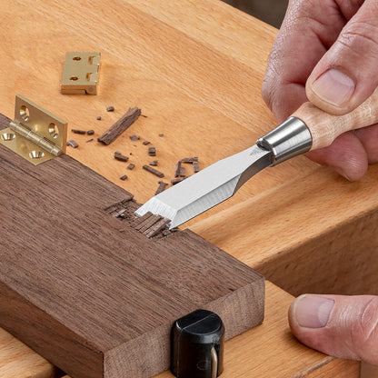 Blue Spruce Butt Chisel cleaning out a hinge slot in a workpiece.