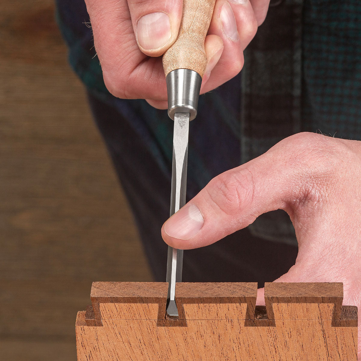 Blue Spruce Dovetail Chisel clearing out a dovetail.