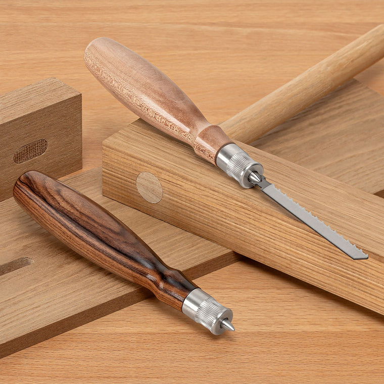 The Blue Spruce Jigsaw Blade Handle shown in Curly Maple and Bolivian Rosewood.