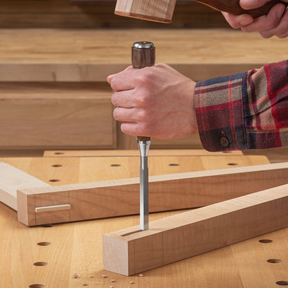 In Blue Spruce Mortise Chisels, the striking cap has a direct connection to the cutting edge through a central steel core. All the energy of your strike is delivered to the cut.