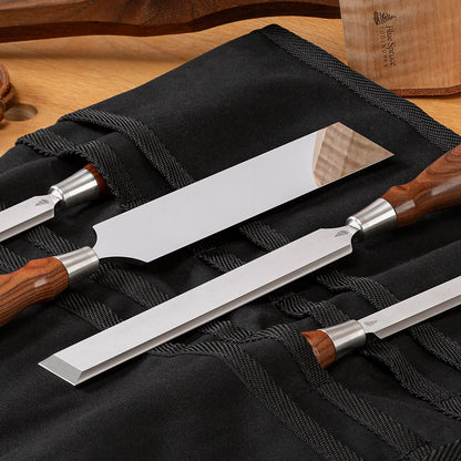 Group of Blue Spruce Paring Chisels with Bolivian Rosewood handles in a Blue Spruce Canvas Tool Roll (sold separately).