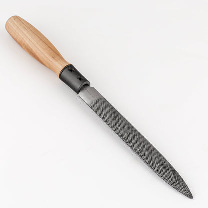 Rasp with a wooden handle on a white background