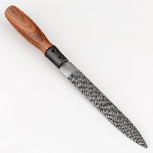Rasp with a wooden handle on a white background