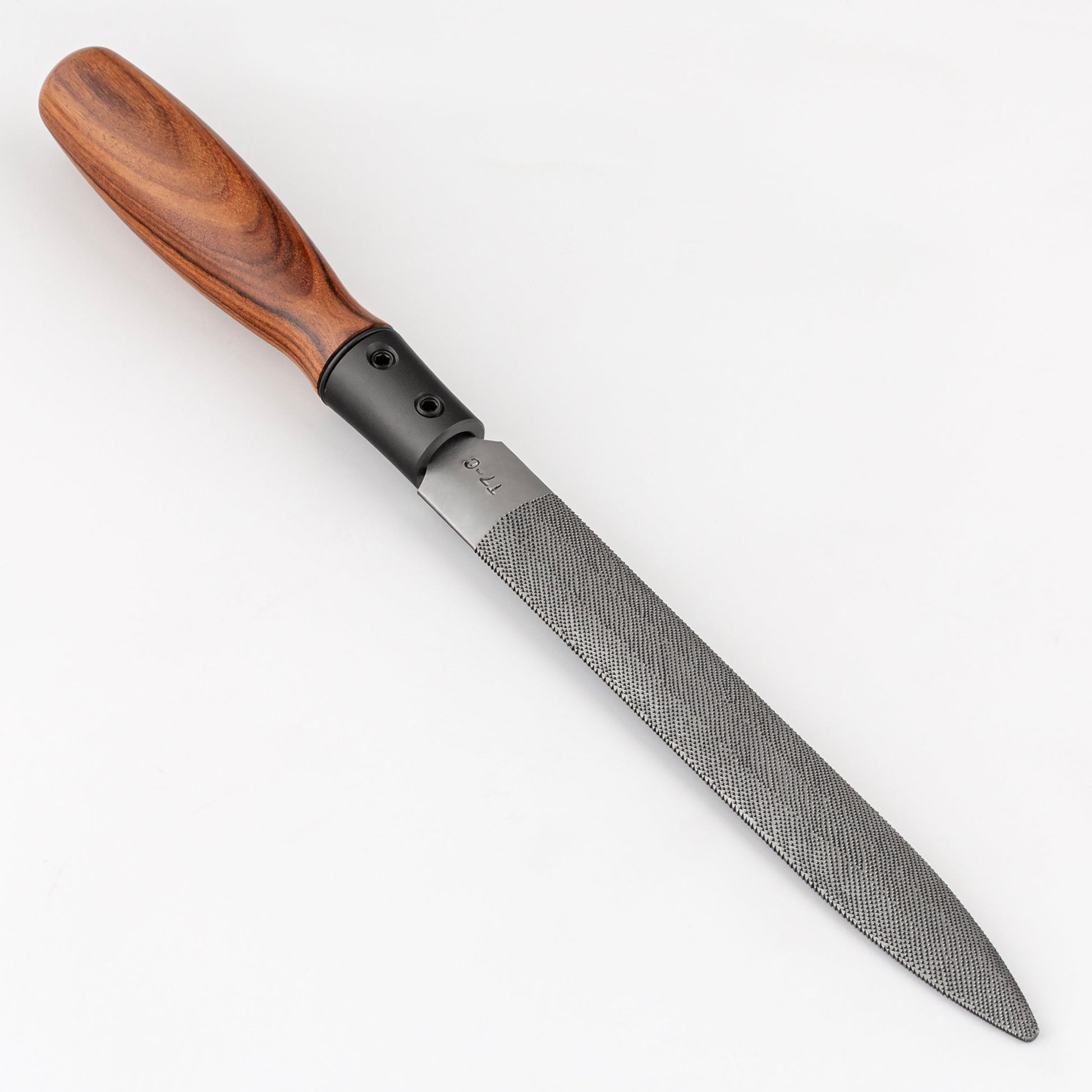 Rasp with a wooden handle on a white background