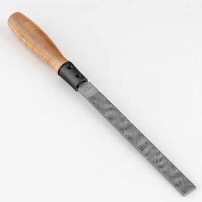 Rasp with wooden handle on a white background