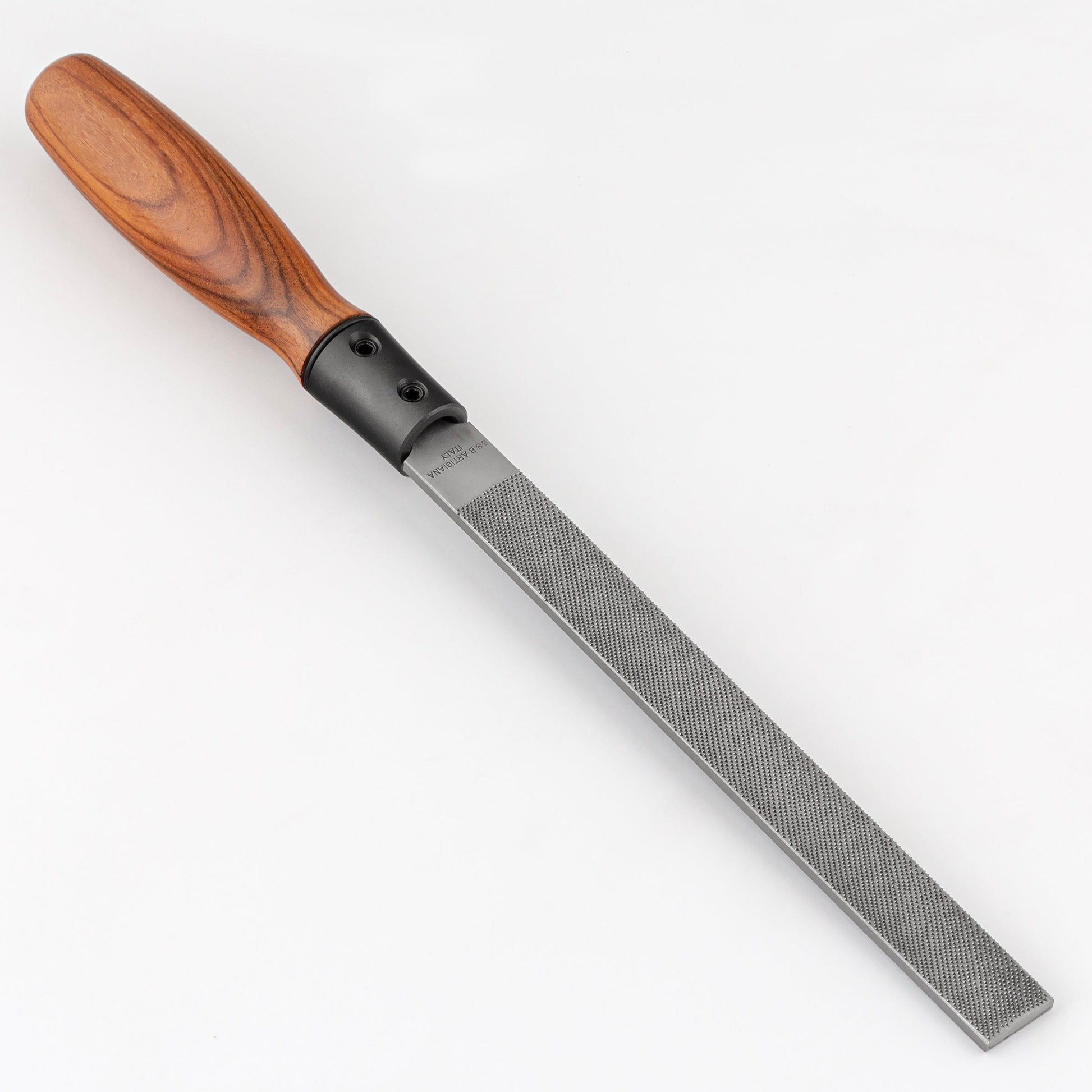 Rasp with wooden handle on a white background