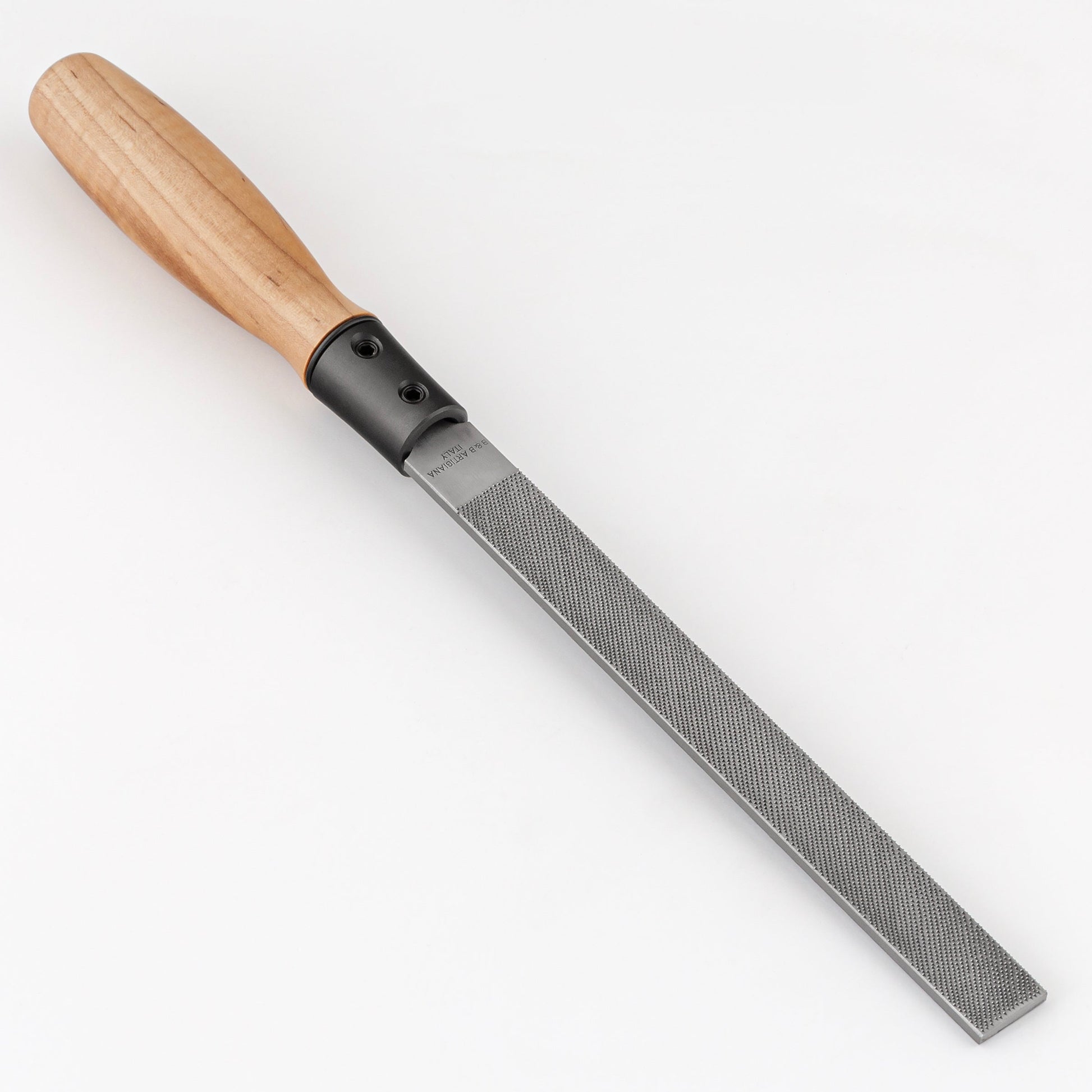 Rasps with curly maple handle on a white background
