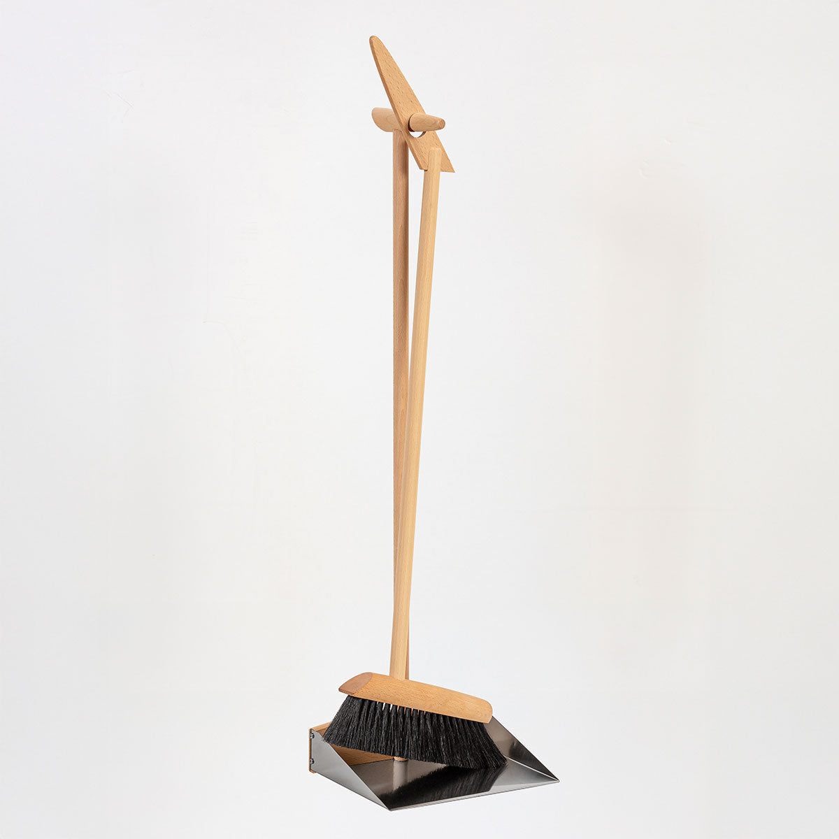 Long-Handled Dustpan and Broom can be connected at the handle for easy storage.